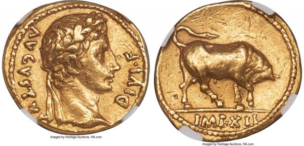 Lot 31028 > Augustus (27 BC-AD 14). AV aureus (20mm, 7.82 gm, 7h). NGC Choice XF 5/5 - 2/5, Fine Style, bent, marks. Lugdunum, 11-10 BC. ΛVGVSTVS-DIVI•F, laureate head of Augustus right / IMP•XII, bull charging right, head lowered, right foreleg raised, lashing his tail. RIC I 186a. Calicó 222.  Augustus' large 'bull coinage' strike at the Gallic mint of Lugdunum came at a time of aggressive expansion for the regime. The bull is a visual reference to the city of Thurium in Lucania, to which Octavian's household had a strong connection. While serving as Praetor, the father of Octavian, Gaius Octavius, led Roman forces to victory over a band of rebel slaves near Thurium in 60 BC. Probably in commemoration of this victory, Octavius bestowed on his then three-year-old son the cognomen Thurinus. Octavius died the following year and young Octavian soon dropped Thurinus from his name completely, but after his rise to power he recalled the familial connection by using a charging bull (the type used by Thurium in its Greek coinage of previous centuries) in its imagery.