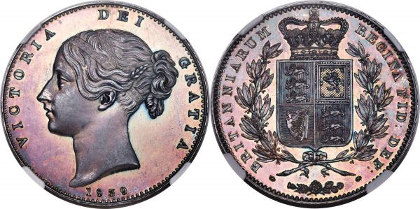 Lot 31091 > Victoria Proof Crown 1839 PR64 Cameo NGC, KM741, S-3882. Plain edge. Heralding from Victoria's 1839 Proof set (a delayed issue commemorating her coronation in 1837), and by far the most popular silver offering included in this group; indeed, this is likely Britain's most popular Proof set of all time for its wide array of currency and Proof types, most notably the Una and the Lion 5 Pounds. This offering boasts superlative preservation and notably a 'cameo' designation for its gorgeous, gleaming portrait of the young Queen picked out in matte frost, the fields behind darkened through a rich pink-violet tone yet flashing into brilliance when tilted in the light. Exhibiting immense eye appeal and a covetable technical quality, this piece is sure to find its way into an elite collection of high-grade British Crowns.