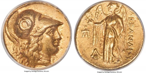 Lot 30022 > MACEDONIAN KINGDOM. Alexander III the Great (336-323 BC). AV stater (17mm, 6h). ANACS XF40. Lifetime or early posthumous issue of 'Amphipolis', ca. 330-320 BC. Head of Athena right, hair falling loose, wearing necklace and crested Corinthian helmet pushed back on head, short parallel crest ends, the bowl decorated with coiled serpent / AΛEΞANΔPOY, Nike standing left, wreath in outstretched right hand, stylis cradled in left arm; trident head downward in left field, AO monogram below wing in left field. Price 179.