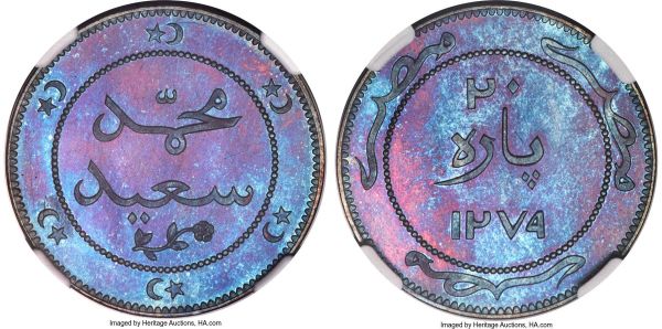 Lot 30261 > Abdul Aziz in the name of Muhammad Sa'id Pasha bronze Specimen Pattern 20 Para AH 1279 (1863) SP66 Brown NGC, KM-Pn12. The finest graded example of its type showing fully iridescent surfaces layered in multi-chromatic electric colors of cobalt and violet. A true gem that would be difficult to improve upon.