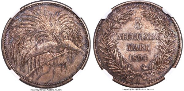 Lot 30300 > German Colony. Wilhelm II 5 Mark 1894-A AU55 NGC, Berlin mint, KM7. A highly appealing cabinet-toned example displaying pale midnight blue tones embracing the devices amidst soft patination throughout. 