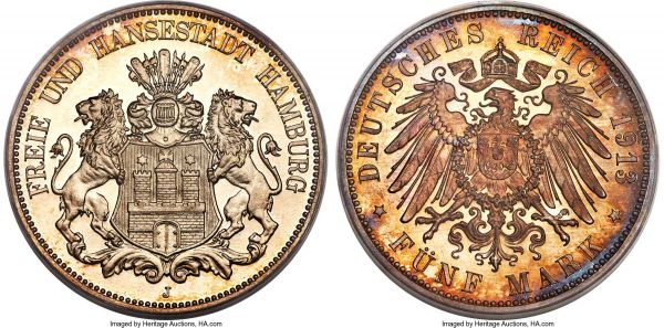 Lot 30312 > Hamburg. Free City Proof 5 Mark 1913-J PR66 Cameo PCGS, Hamburg mint, KM610, J-65. Helmeted arms with lion supporters / Crowned Imperial eagle with date and value. An extraordinary Proof example, with bold, nicely frosted devices and sharp cameo contrast with a touch of golden patina around the peripheries. The reverse exhibits attractive gray and gold toning. A pleasing gem Proof example of this final-year issue.