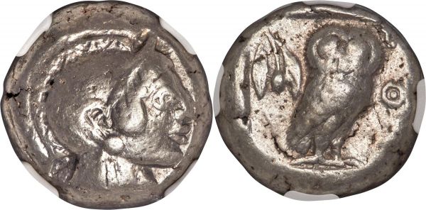 Lot 30038 > ATTICA. Athens. Ca. 510/500-480 BC. AR tetradrachm (21mm, 16.77 gm, 11h). NGC VF 5/5 - 4/5. Head of Athena right, wearing crested Attic helmet, the crest box ornamented with chevron pattern / AΘΕ, owl standing right with closed wings, head facing; drooping olive sprig with two leaves and one berry behind, all within incuse square. HGC 4, 1590 (ca. 500/490-485/480 BC). Seltman Groups C, G and M.