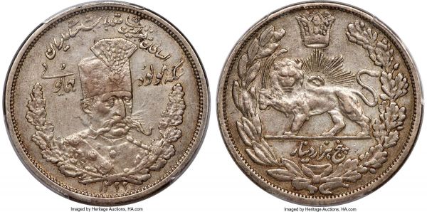 Lot 30432 > Qajar. Muzaffar al-Din Shah silver 5000 Dinars (5 Kran) AH 1322 (1904) AU50 PCGS, Tehran mint, KM980, Dav-287, Kian-161 (RRR). Struck to commemorate the Shah's birth. A superb rarity within the late Qajar silver series, with examples of this one-year commemorative virtually never escaping the VF level, and frequently found mounted or cleaned. Still holding die polish around the sun and lion motif, the present specimen is one of just two pieces certified at this level, with just one having been awarded Mint State between NGC and PCGS combined. 