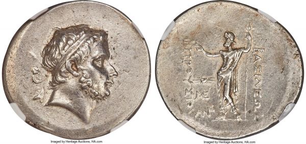 Lot 30054 > BITHYNIAN KINGDOM. Prusias I (ca. 230-182 BC). AR tetradrachm (37mm, 16.94 gm, 1h). NGC Choice XF 5/5 - 3/5. Diademed head of Prusias I right / ΒΑΣΙΛΕΩΣ / ΠΡΟΥΣΙΟΥ, Zeus standing facing, head left, crowning royal name with diadem in right hand, scepter in left; thunderbolt above ME monogram above ANΣ monogram in inner left field. Waddington 9b. Jameson 1387. SNG von Aulock 6878.  Even before the Wars of Diadochi had concluded, the region of Bithynia in Asia Minor along the southern coast of the Black Sea had declared its independence from the vast realms ruled by Alexander's successors. Bithynia's kings were part of a native dynasty descended from two Thracian tribes that occupied the region centuries earlier, with admixture of royal Persian blood. Of the early dynasts, Zipoetres, Nicomedes I, and Ziaelas, we know comparatively little, except their evident love for war and plunder. Prusias I, the fourth independent king of Bithynia, was celebrated for his love of Greek culture and his ability to maintain his kingdom's power and prosperity during a time of turmoil in the Hellenistic world. He successfully conducted wars against the Galatians and the Attalid Kingdom of Pergamum, the latter with the help of the great Carthaginian General Hannibal. However, after first granting Hannibal refuge, Prusias was forced to give him up to the Romans, who demanded his surrender; Hannibal took poison in response. The portrait coins of Prusias are among the finest of the Hellenistic series, depicting him with a luxuriant set of chin-whiskers and a self-satisfied smirk.