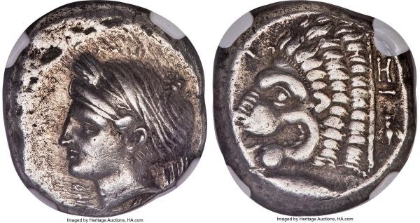 Lot 30057 > MYSIA. Cyzicus. Ca. 390-330 BC. AR tetradrachm (23mm, 15.07 gm, 6h). NGC Choice XF 4/5 - 3/5. Head of Kore-Soteira left, wearing single-pendant earring, two grain ears in hair tucked in sphendone / KY-ZI, head of lion left, mouth open with tongue protruding; bee behind, tunny left below. SNG von Aulock 7344.
