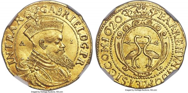 Lot 30648 > Gabriel Bethlen gold Ducat 1620-AI MS61 NGC, Karlsburg mint, KM126, Fr-353, Resch-40. 3.41gm. GABRIEL D G P R | IN TRAN, armored bust right wearing fur cap, A-I to either side across fields / PAR • RE • HVNG • DOM • ET • SIC • COM • 1620, crowned arms of Bethlen. An exceedingly handsome and carefully produced ducat, exhibiting an engaging glassy luster in the margins and hardly the least evidence of waviness or bending in the flan. 