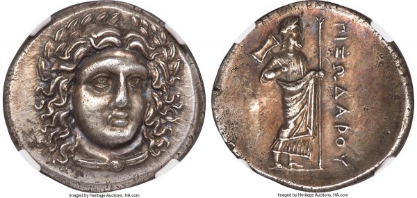 Lot 30066 > CARIAN SATRAPS. Pixodarus (ca. 341/0-336/5 BC). AR didrachm (22mm, 6.91 gm, 12h). NGC Choice AU 5/5 - 3/5, Fine Style, brushed. Laureate bust of Apollo facing, turned slightly right, hair parted in center and swept to either side, cloak fastened around neck / ΠIΞΩΔAPOY, Zeus standing right, bipennis in right hand over shoulder, scepter in left. Konuk, Coin Hoards IX, 36c. SNG Copenhagen 596-7. SNG von Aulock 2375-6. Stunning high-relief obverse, with contrasting toning which serves to bring the portrait to life.