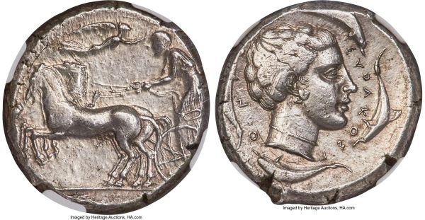 Lot 30007 > SICILY. Syracuse. Second Democracy (ca. 440-430 BC). AR tetradrachm (26mm, 17.42 gm, 4h). NGC Choice XF 3/5 - 2/5, Fine Style, brushed. Charioteer driving prancing quadriga left, kentron in right hand, reins in both; Nike flying right above to crown driver, ketos left in exergue / ΣYRAKOΣI-ON, head of Arethusa right, wearing pendant earring and plain necklace, hair drawn up and tied at top; four dolphins swimming clockwise. Boehringer 604 (V296/R410). Jameson 775 (these dies). SNG Copenhagen 652 (same).  Ex M. L. Collection of Coins of Magna Graecia and Sicily (Numismatica Ars Classica, Auction 82 (20 May 2015), lot 57; Numismatic Fine Arts, Fall Mail Bid Sale (1990), lot 93