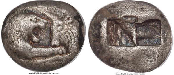 Lot 30076 > LYDIAN KINGDOM. Croesus (561-546 BC). AR stater or double siglos (18mm, 10.51 gm). NGC Choice VF 5/5 - 3/5. Sardes. Confronted foreparts of lion right and bull left, both with outstretched foreleg / Two square punches of different size, side by side, irregular interior surfaces. SNG von Aulock 2873-4. Traité I 407-8. Berk, 100 Greatest Ancient Coins, 9.19.
