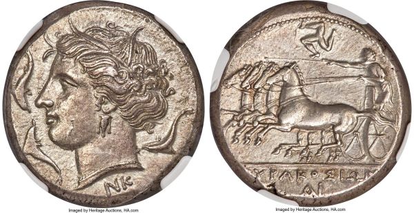 Lot 30009 > SICILY. Syracuse. Agathocles (317-289 BC). AR tetradrachm (26mm, 16.98 gm, 1h). NGC Choice AU 5/5 - 4/5, Fine Style. Pre-royal coinage, ca. 310-305 BC, Nk-, magistrate. Head of Persephone left, wreathed with grain ears, wearing triple-pendant earring and necklace; three dolphins swimming around, NK below neck truncation, dotted border / ΣYPAKOΣIΩN, charioteer driving fast quadriga left, reins in left hand, kentron in right; triskeles above, AN monogram in exergue, dotted border. HGC 2, 1348. SNG ANS 637 var. (NK ligate).  Ex Numismatic Fine Arts, Auction XXVIII (23 April 1992), lot 582