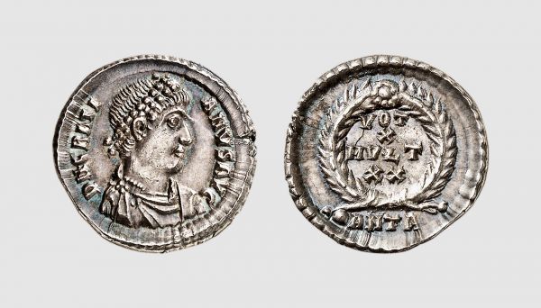 Empire. Gratian. Antioch. AD 367-375. AR Reduced Siliqua (2.15g, 12h). RIC 34f; Tradart 5.100 (this coin). Old cabinet tone. A lovely coin. Choice extremely fine. From a private collection; Tradart 1992 (2) lot 282; Schweizerische Kreditanstalt 1987 (7) lot 1029; Frank Sternberg 1973 (3) lot 471; former Paul Tinchant (1893-1981) collection, Jacques Schulman1966 (243) lot 2342