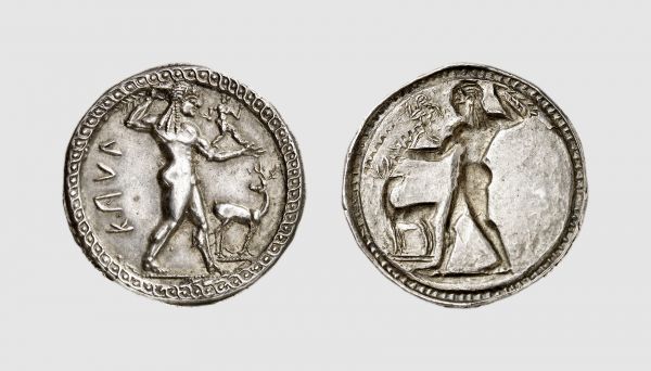 Bruttium. Caulonia. 525-500 BC. AR Nomos (8.58g, 12h). Johnston-Noe A9; SNG ANS 145 (this obverse die). Very rare. Old cabinet tone. Perfectly centered and struck on a full flan. A coin of great elegance and charm. Possibly the finest known. Superb extremely fine. From a private collection; former Armand Trampitsch (1893-1975) collection, Jean Vinchon 1986 (13 November) lot 37
 
 The amazing figure of Apollo on the archaic coinage of Caulonia has been much discussed, as it appears to represent a particular part of the legend of Apollo, the famous god of prophecy at Delphi. In the foundation myth of this shrine, Apollo was said to have killed the serpent Pytho, and in order to purify himself, he went to the Vale of Tempe, a gorge in Thessaly. A messenger carried a branch of laurel back to Delphi, whose small figure can be seen running on this coin on Apollo's outstretched left arm. In the archaic period Caulonia was a Greek colony of considerable importance though very little is known of its history. In antiquity it was said to be one of the places in which the Greek philosopher Pythagoras was active