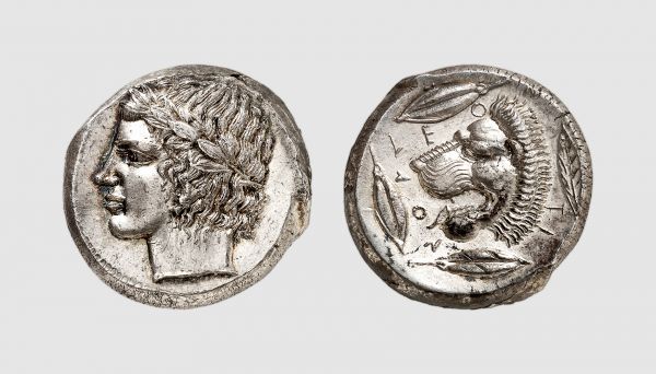 Sicily. Leontini. 430-425 BC. AR Tetradrachm (17.43g, 3h). Attributed to the Leaf Master. Boehringer 55 (same dies); Rizzo 24.4 (same dies). Lightly toned. Perfectly centered and struck. Insignificant usual die break on obverse. An exceptional specimen of this desirable issue, a severe portrait of great intensity. Superb extremely fine. From a private collection; The Numismatic Auction 1985 (3) lot 28