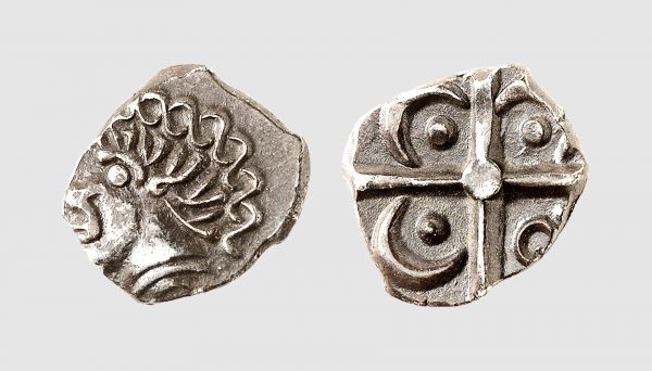 Gallia. Tolosates. 2nd century BC. AR Drachm (2.65g). LT 2986; Savès 75. Old cabinet tone. The sole Celtic coinage depicting an Ethiopian! Choice extremely fine. From a private collection
 
 