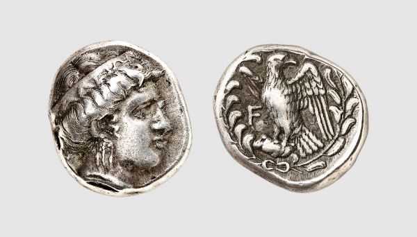 Elis. Olympia. 328 BC (105th Olympiad). AR Stater (12.13g, 2h). BCD 163; Seltman 357. Very rare. Old cabinet tone. Worn obverse die, otherwise, a charming coin. Good very fine. From a private collection; former Merrill-Lynch's Athena fund, Sotheby's 1993 (27 October) lot 572; former Frederick Knobloch (1907-1994) collection, Stack's 1970 (10 June) lot 302