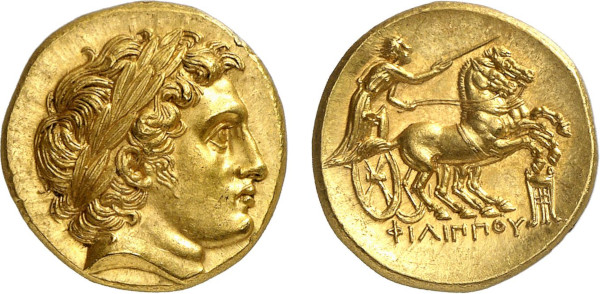 MACEDON, Philip II. Circa 323-317 BC. AV Stater (8.61g). Kolophon mint. Laureate head of Apollo right, with the features of Alexander III. Rev. Charioteer driving fast biga right, holding kentron and reins; tripod below. Jameson 978 = Kunstfreund 232. Superb extremely fine.