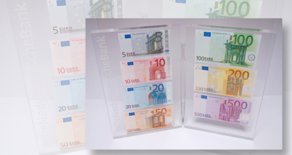 Netherlands, De Nederlandse Bank, Plexiglas display case of all seven euro note denominations (2002).
De Nederlandse Bank, the central bank of the Netherlands, created a Christmas present for its employees in 2017. The gift was one of each euro bank note, from 5 to 500 euros, a total of 885€ in face value. The seven notes were mounted as a set and sealed in a two piece, hinged Plexiglas display case embossed with the name of the bank.