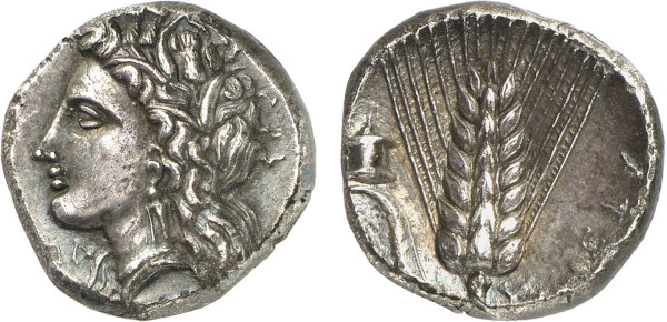 LUCANIA, Metapontum. Circa 330-290 BC. AR Nomos (7.74g). Head of Demeter left, wearing wreath of grain ears, triple-pendant earring, and necklace. Rev. Barley grain with leaf to left; lit altar above leaf. Johnston 10.4; HN Italy 1593; Old cabine tone. Good very fine