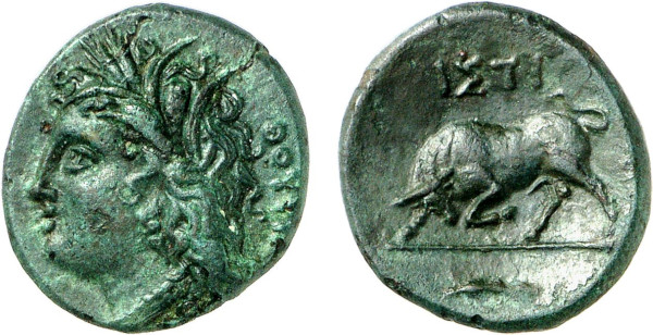 LUCANIA, Thourioi. 3rd century BC. Æ (3.53g). Head of Demeter left. Rev. Bull charging left; in exergue, fish. Laffaille 14 = Strauss 62 = MAST 15 (this coin). Nice green patina. Extremely fine. Former Maurice Laffaille (1902-1989) collection