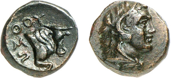LUCANIA, Thourioi. 3rd century BC. Æ (1.39g). Head of youthful Heracles right, wearing lion's skin. Rev. Forepart of bull right. BMC 140; SNG Morcom 324. Lovely dark green patina. Extremely fine. Privately acquired from Tradart