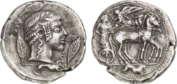 SICILY, Leontini. Circa 466-460 BC. AR Tetradrachm (16.21g). Dies by the Demareteion master. Charioteer, holding kentron and reins, driving slow quadriga right; above, Nike flying left, crowning charioteer; in exergue, lion right. Rev. Laureate head of Apollo right; three leaves around; below, lion right. Basel 348; Boehringer 28; Gulbenkian 211. Very rare. Good very fine