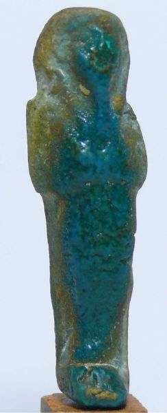 Egypte - Basse époque - Oushebti en fritte émaillée bleue  - 664-332 av. J.-C. - (26ème-30ème dynastie) Oushebti en fritte émaillée bleu turquoise. Belles traces de polychromie turquoise au dos et sur le devant de l'objet. 49 mm.