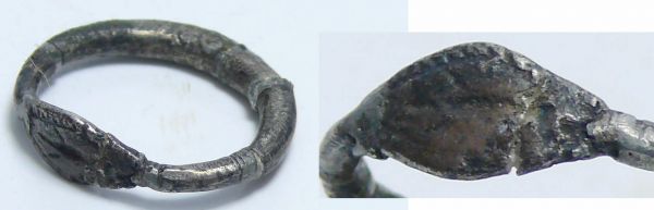 Romain - Bague en argent  - 200 / 400 ap. J.-C. Bague en argent au châton représentant un lézard. Traces de restauration. 25 mm.