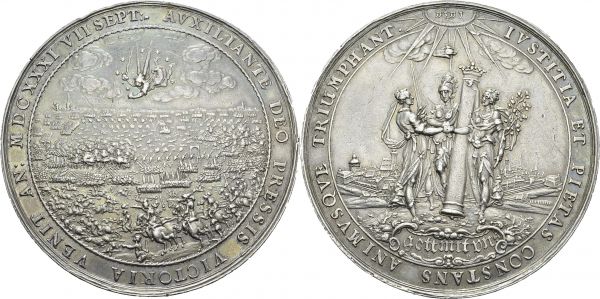 Johann Georg I. 1615-1656. Silver medal 1631 by Sebastian Dadler. 65 mm. The Battle of Breitenfeld. Obv. IVSTITIA ET PIETAS CONSTANS ANIMVSQVE TRIUMPHANT. Pax, Justice and Constantia holding a crowned column, Leipzig in the background. Rev. AVXILIANTE DEO PRESSIS VICTORIA VENIT AN MDCXXXI VII SEPT. A view of the battle. AR. 65.64 g. XF scratch
The Battle of Breitenfeld was the first major victory for the combined Swedish and other Protestant forces in the Thirty Years War.